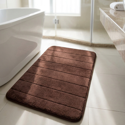 Absorberende badmat in badkamer