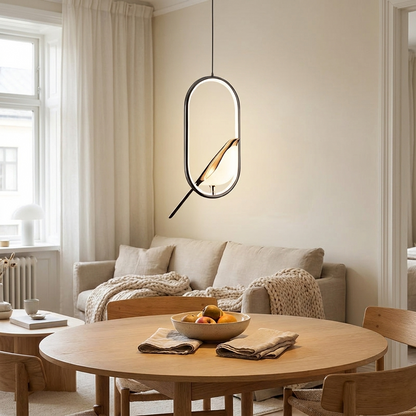 Hanglamp vogel design boven eettafel