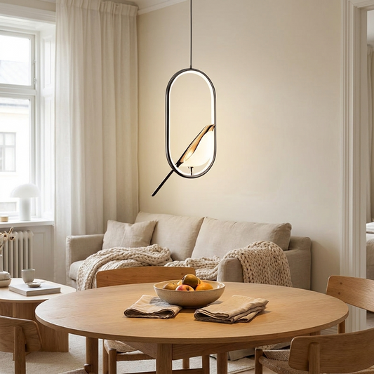 Hanglamp vogel design boven eettafel